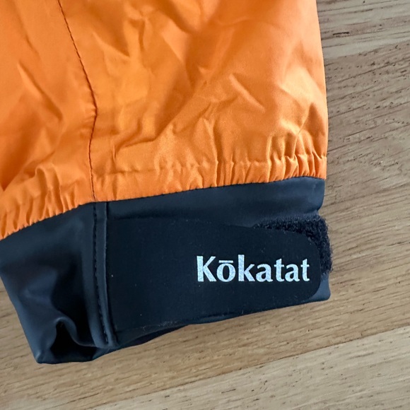 Orange and Black Performance Jacket with Waterproof Design - Picture 2 of 2